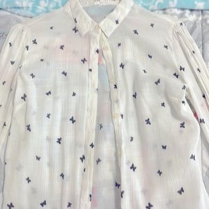 Eight boten up shirt with black butterflies on it Size S/M